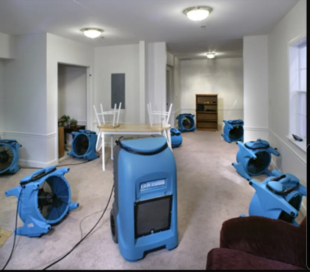 Air movers and dehumidifier setup for Water Damage Restoration in East Haven
